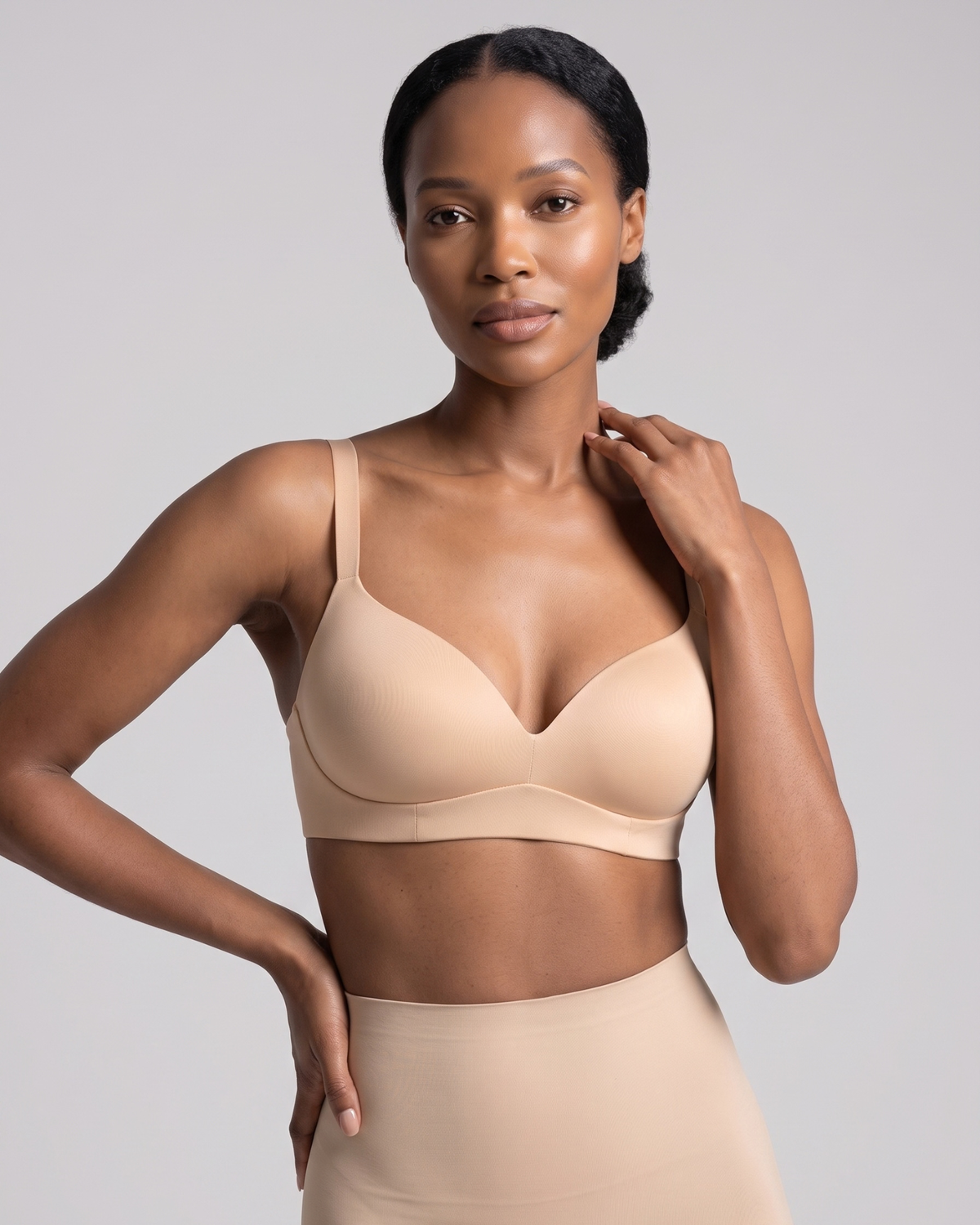 Black women wearing pink bra